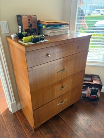 Wooden dresser ready for junk removal